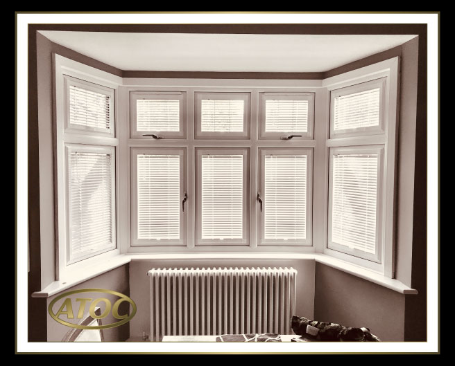 25 mm aluminium venetian blinds installed in Perfect Fit frames on uPVC doors and windows in Essex