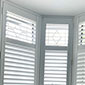Plantation shutters in bay window