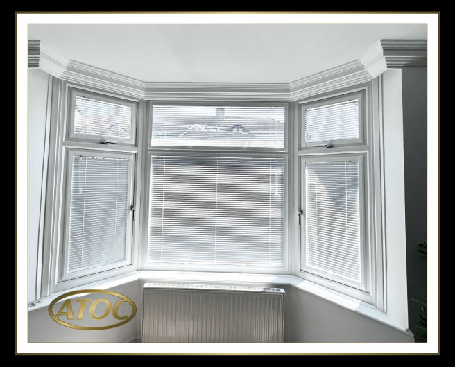 Close-up of Perfect Fit frame and clip brackets with pleated, cellular and 25 mm venetian blind options