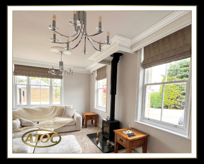 Neatly folded made-to-measure Roman blinds fitted in a modern Essex living room